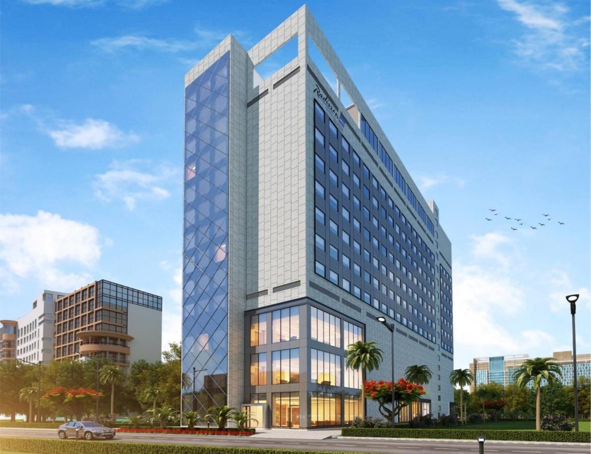 ホテル Radisson Blu Towers Kaushambi Delhi Ncr ガーズィヤーバード エクステリア 写真 The hotel's rendering