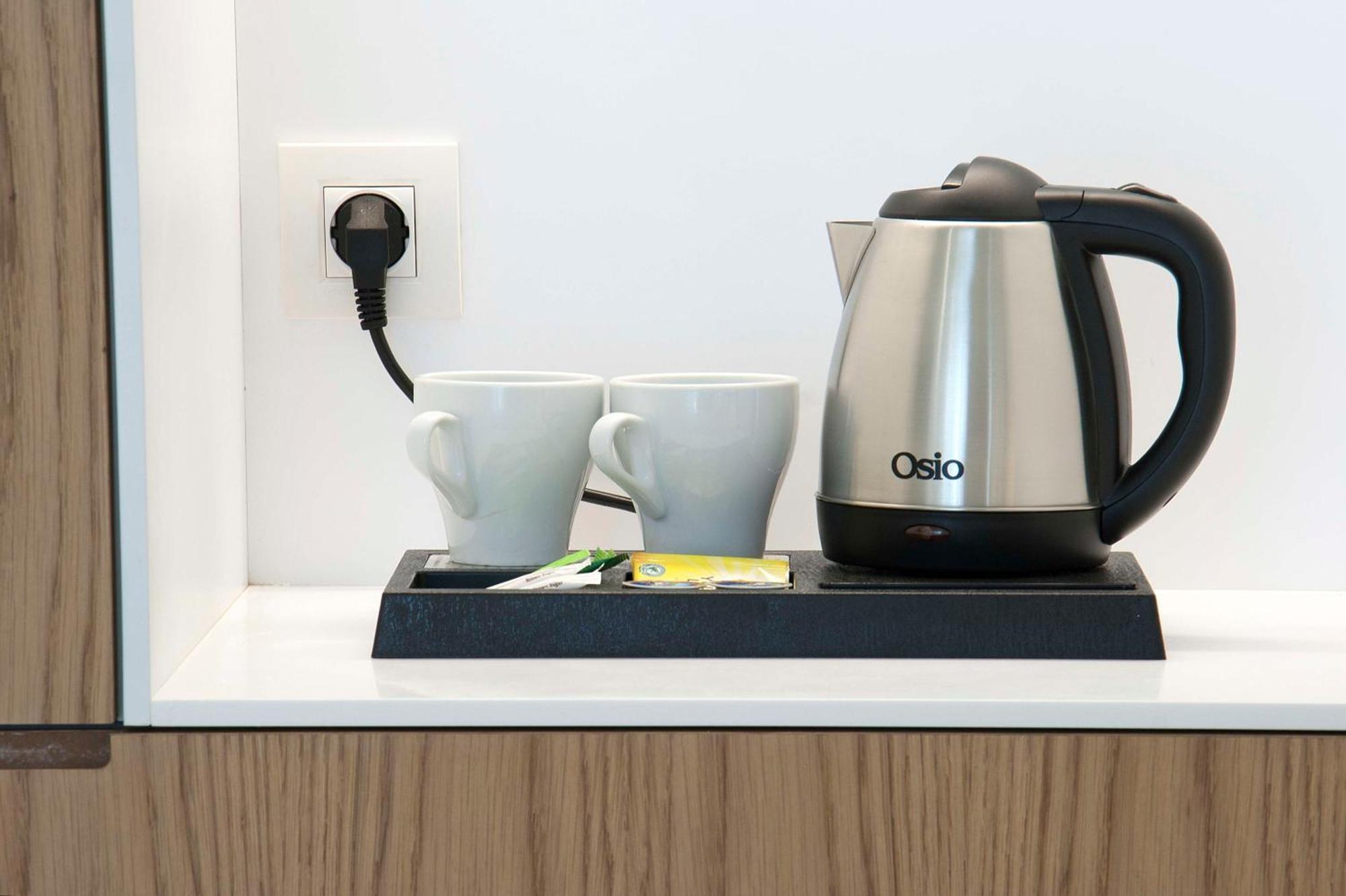 ホテル Radisson Blu Towers Kaushambi Delhi Ncr ガーズィヤーバード エクステリア 写真 A kettle