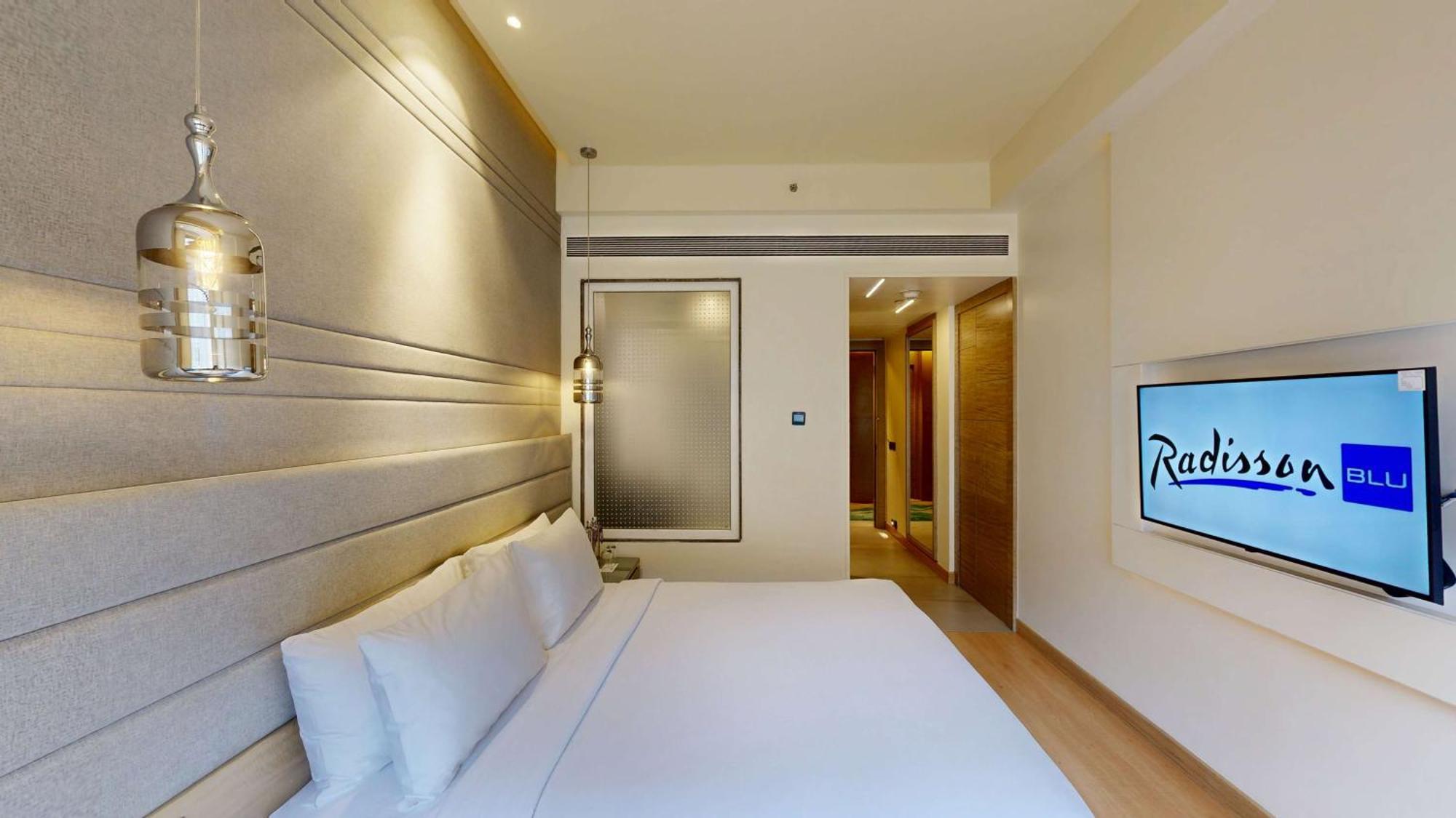 ホテル Radisson Blu Towers Kaushambi Delhi Ncr ガーズィヤーバード エクステリア 写真 Deluxe Room