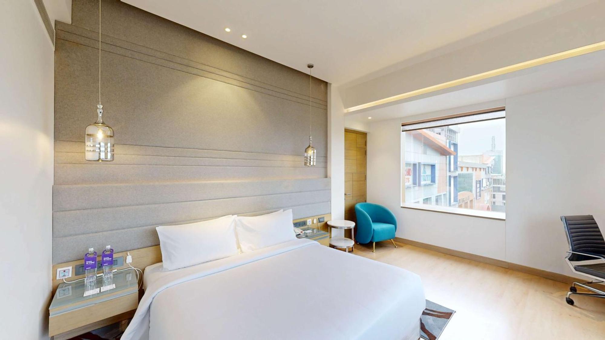 ホテル Radisson Blu Towers Kaushambi Delhi Ncr ガーズィヤーバード エクステリア 写真 A room at the hotel